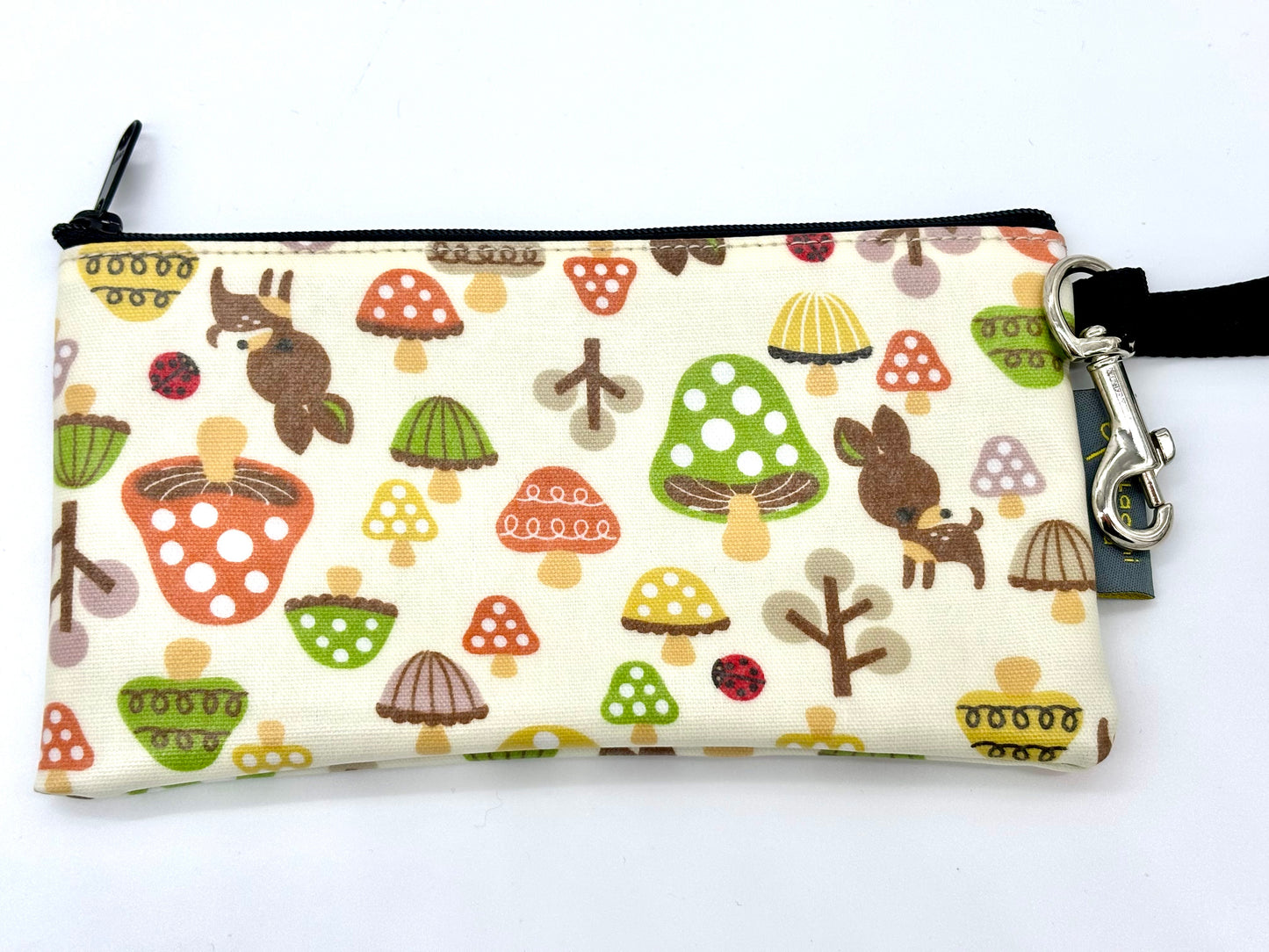 Small Wristlet in Green Mushrooms